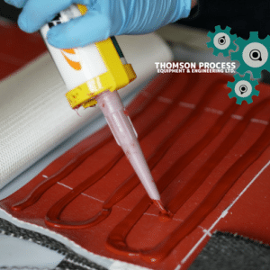 Chemically resistant Fabric Compensators